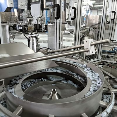 良い価格 非標準的な自動ラミネートキャップ組立機 表面が平らでシールが良さ オンライン
